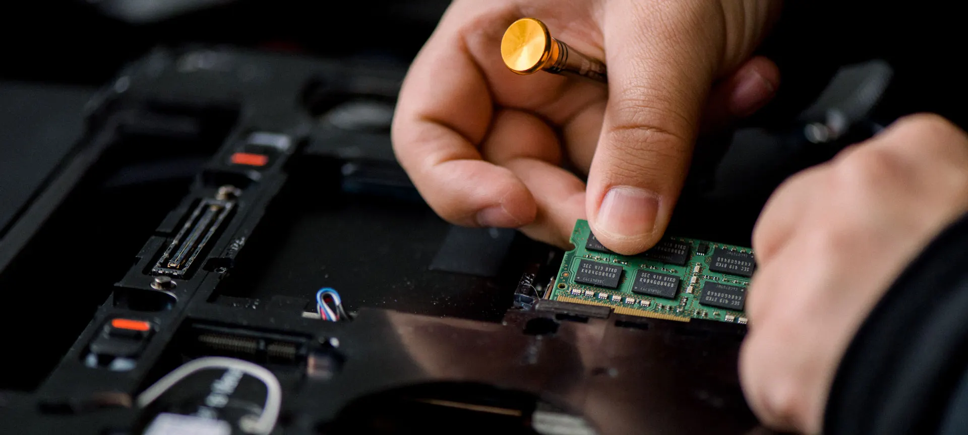 Technician working on business server hardware